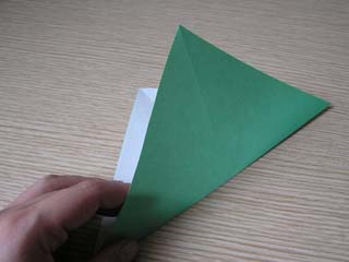 90�x��]�����ĎO�p�ɐ܂��ĊJ��